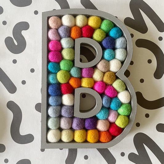 Wooden Rainbow Pom Pom Letter - 20cm Dark Grey